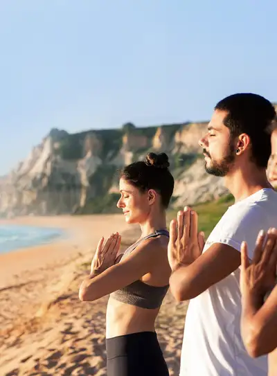 Yoga in full nature by the cliff